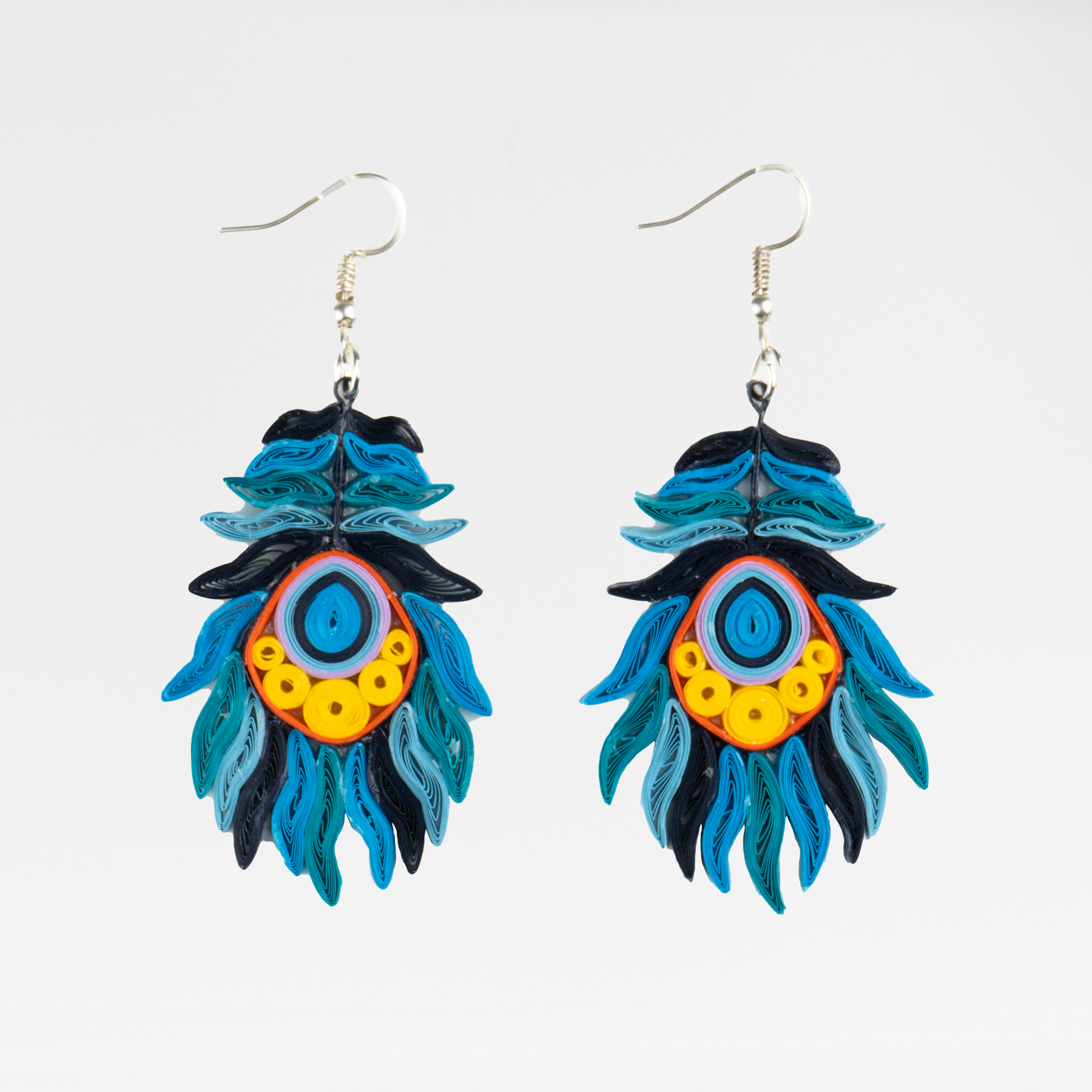 Aretes Plumas Azules Rollito